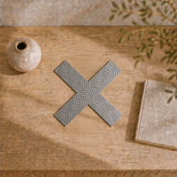 Custom-made tread plate steel cross | John Steel metal cutting